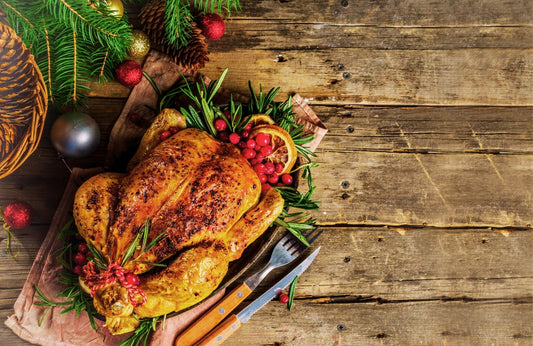 Festive roast chicken with orange, lemon, thyme and crispy garnishes